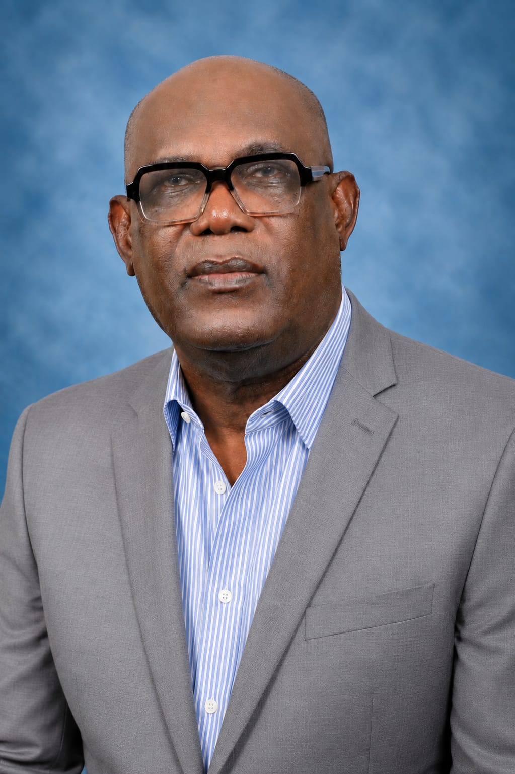 Portrait of Levi L. Johnson, CEO of Eazi Days, in a grey suit